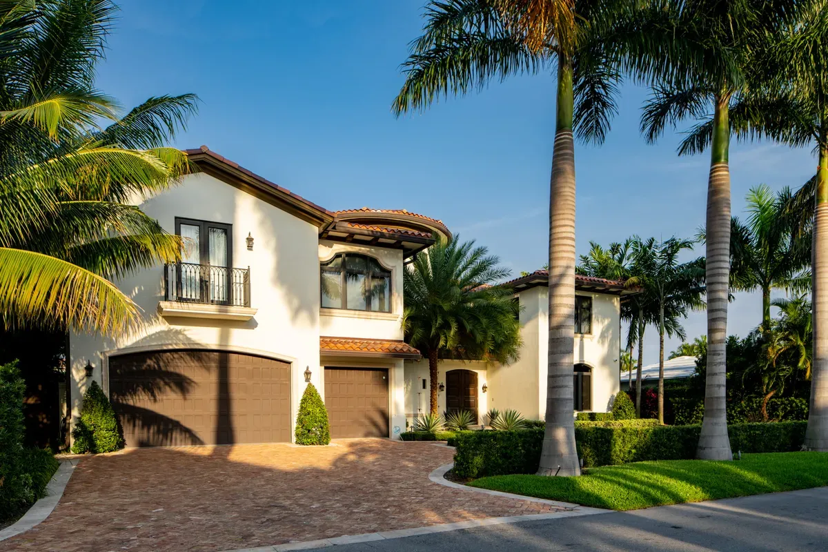 Mediterranean style home with a palm tree in Lake County, Florida